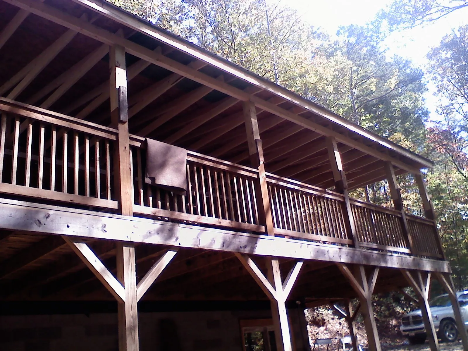 Timber framing under a new elevated porch and deck — Roof Leak Repair in Alsea by Roofing Brothers